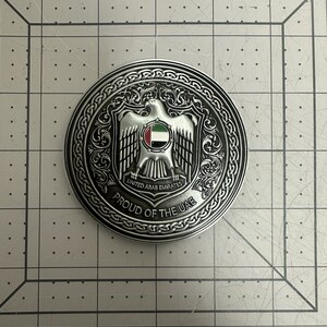 Custom die-cut challenge coin in an irregular shape