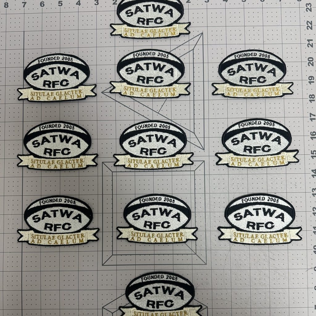 A sheet of custom embroidered club patches