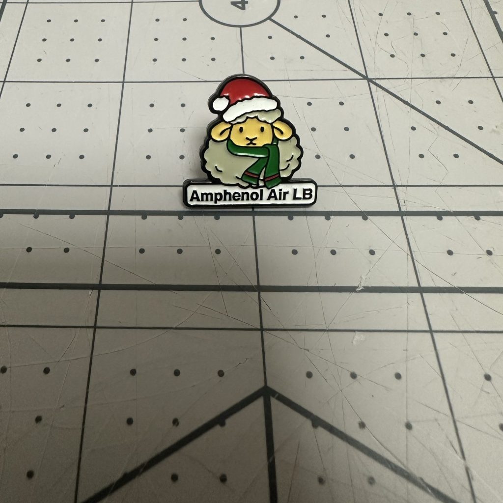 Small custom soft enamel pin in full colour