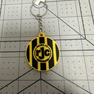 Custom round PVC keychain in yellow and black