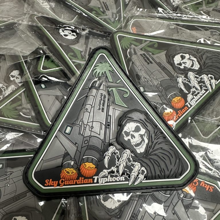Custom triangular PVC squadron patch in subdued colours