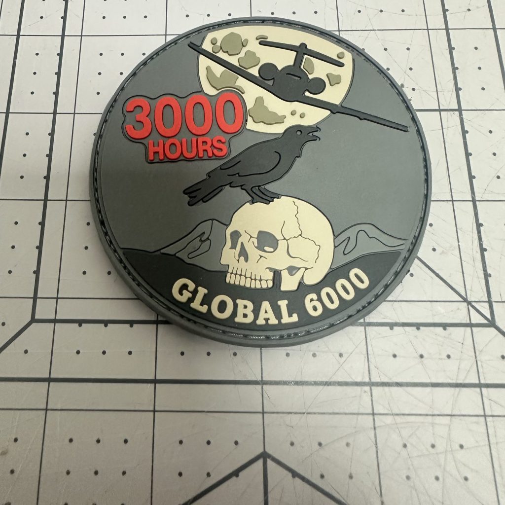 Custom round PVC patch with raised lettering