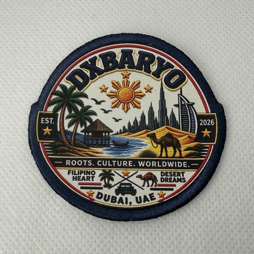 Custom round printed patch with a Dubai skyline scene and a merrowed border
